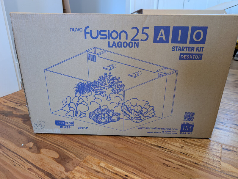 Box containing a nuvo fusion 25-gallon lagoon aquarium